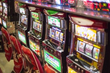 Jurassic Kingdom slot game interface showing reels and dinosaur symbols
